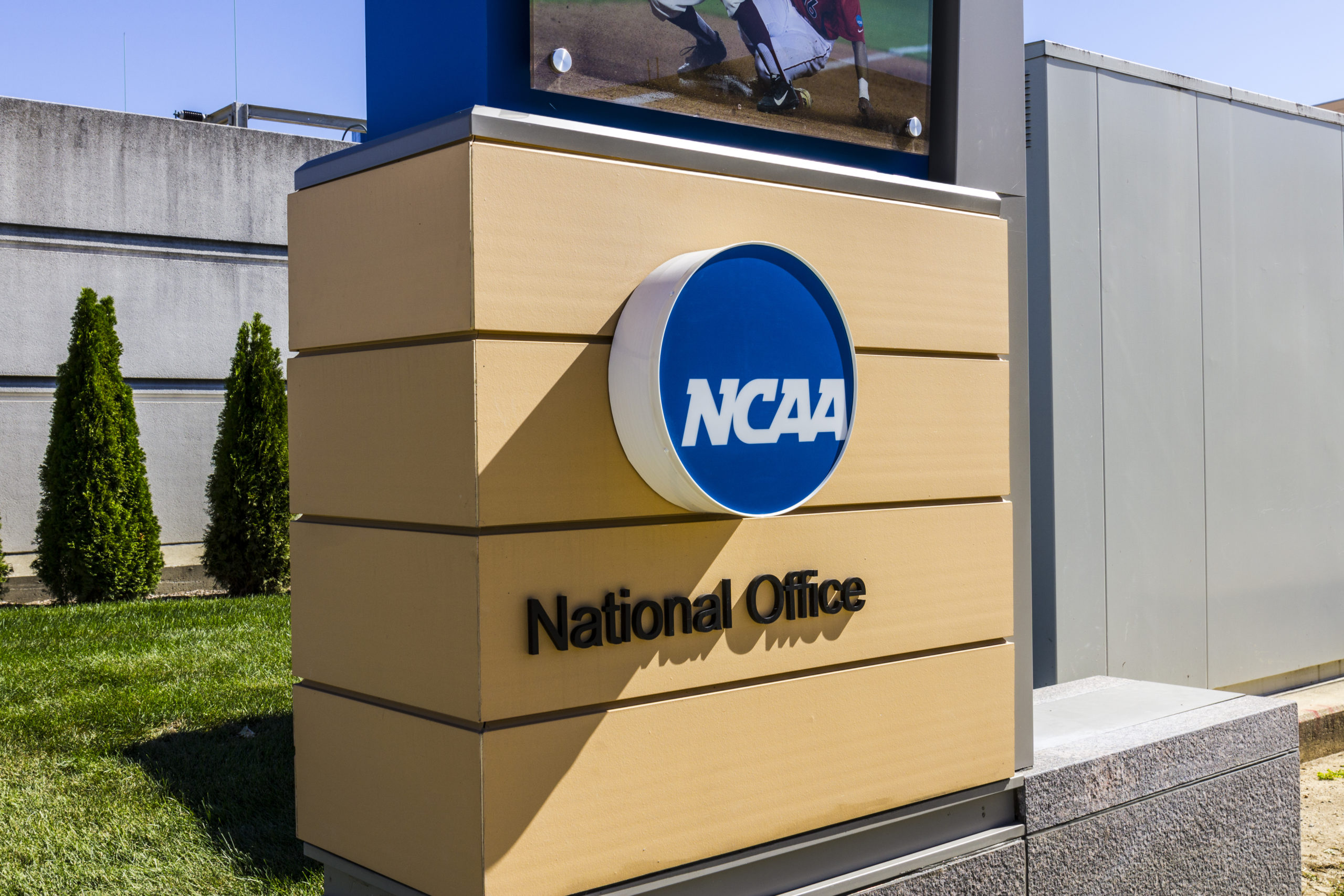 NCAA National office complex sign complex with blue NCAA logo on it.