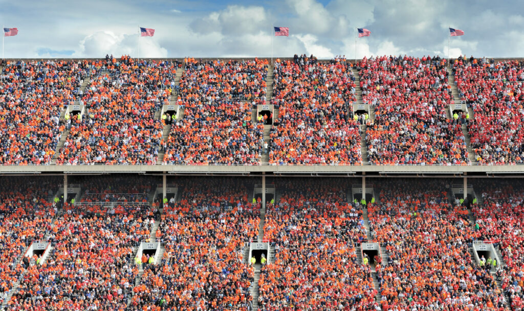Thousands of college football fans dressed in orange. 